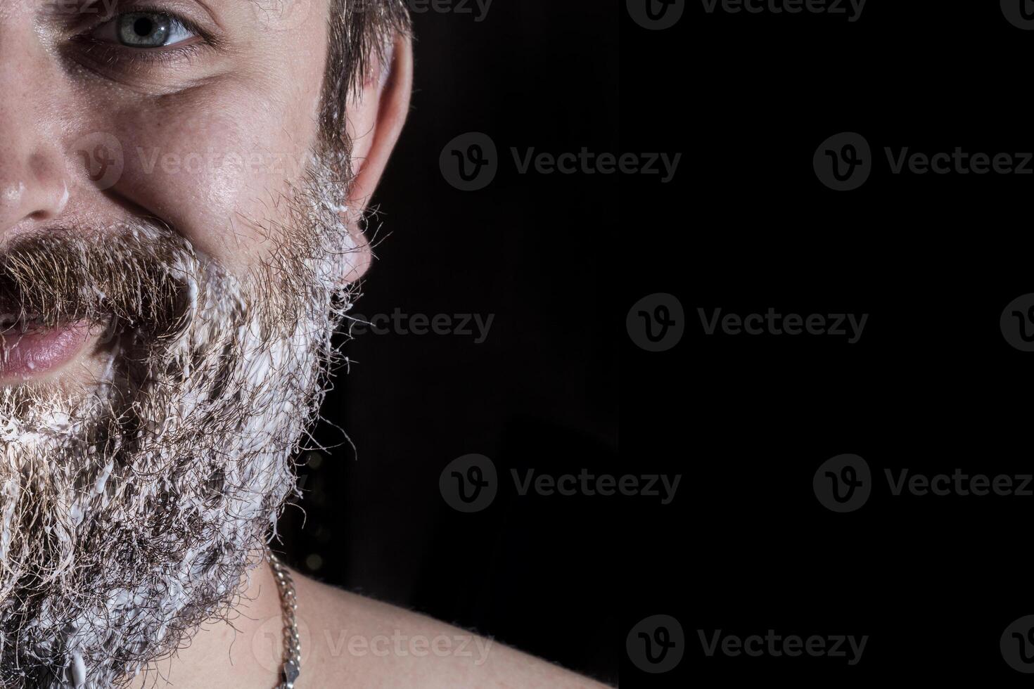 smiling bearded man photo