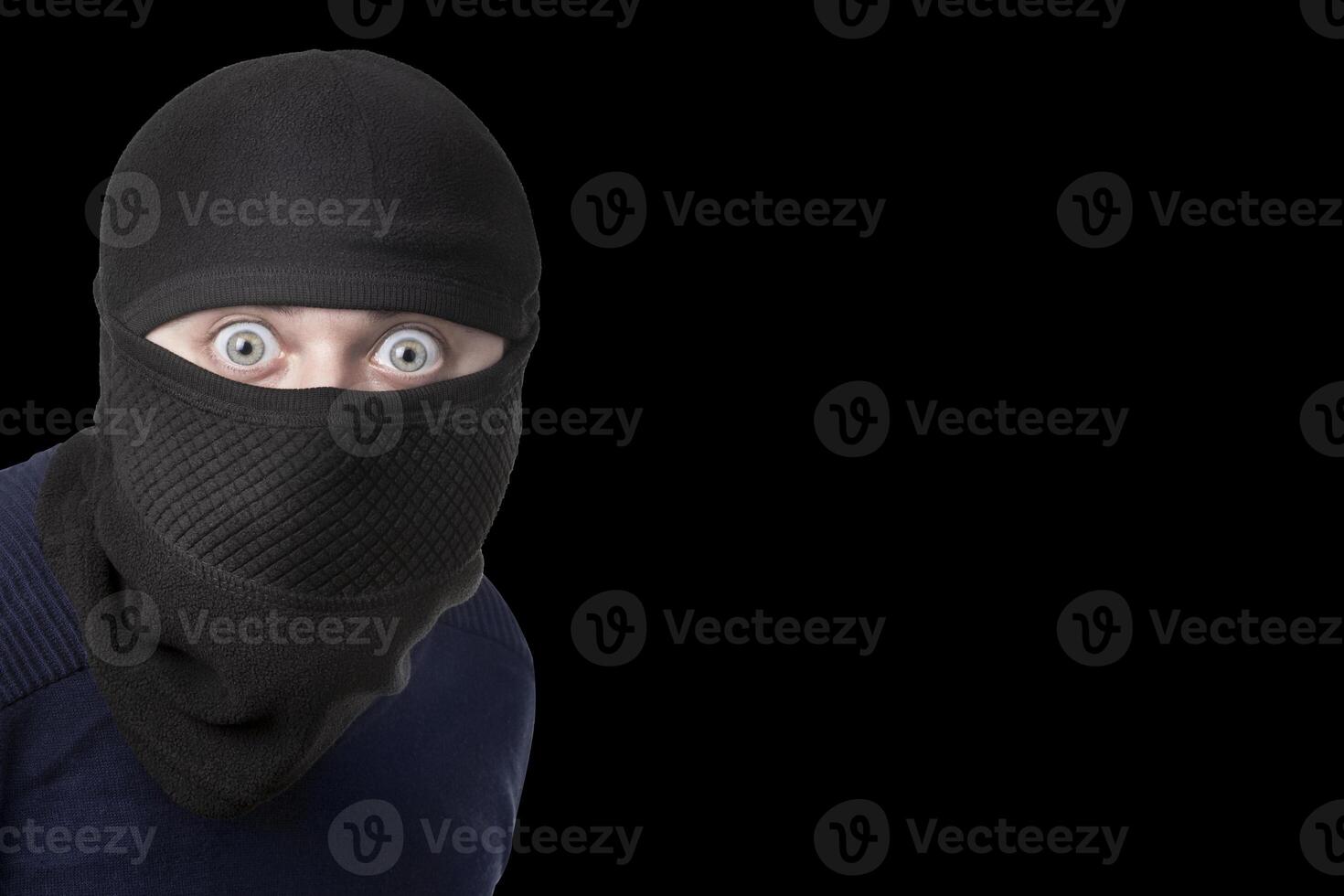 man in balaclava on black photo