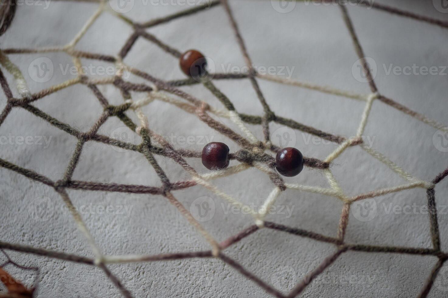Dream catchers, their elements. Natural materials, threads, wood. Omulet for a restful sleep. Shamanism. photo