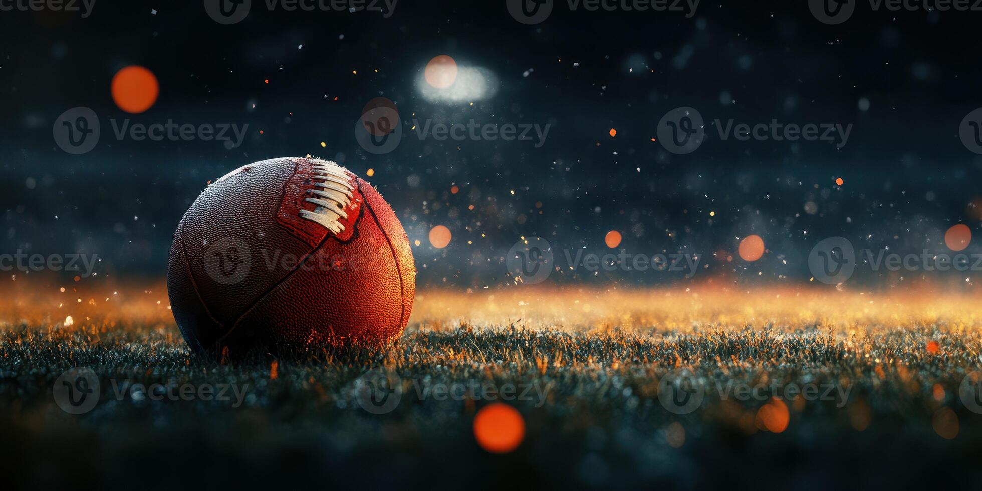 Football resting on wet grass illuminated by stadium lights during a rainy evening match photo