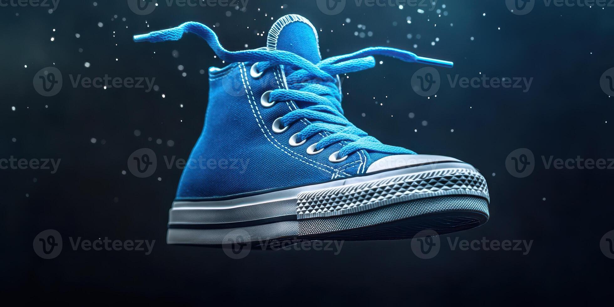 Bright blue high-top sneaker floating against a dark background with sparkles creating a magical atmosphere photo