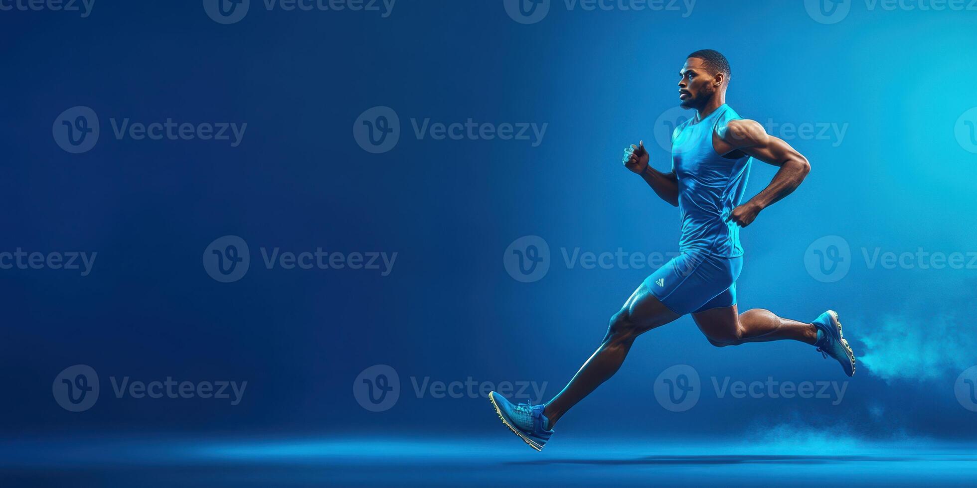 Athlete sprinting at high speed in a dynamic pose on a vibrant blue background during a fitness session photo