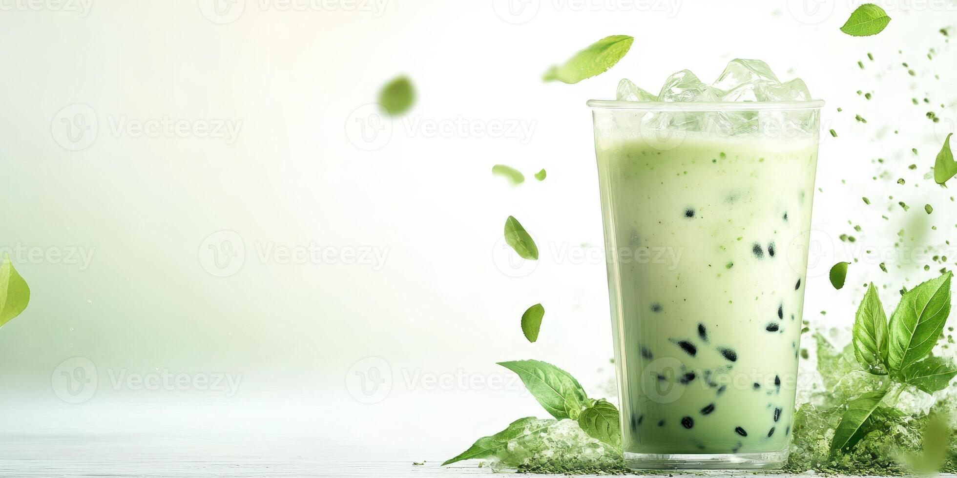 Refreshing green tea drink with ice and mint on a light background for a cool evening refreshment photo