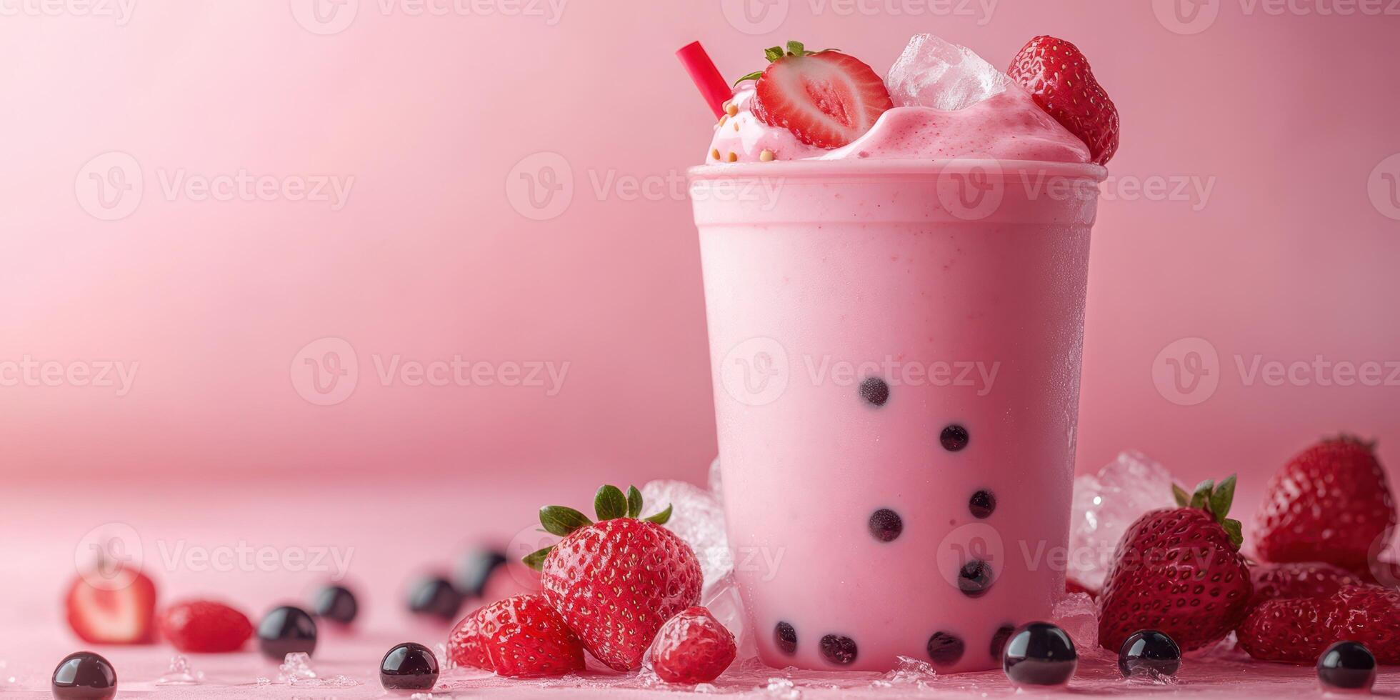 Refreshing strawberry bubble tea served in a pink cup with vibrant berries and ice on a pastel background photo