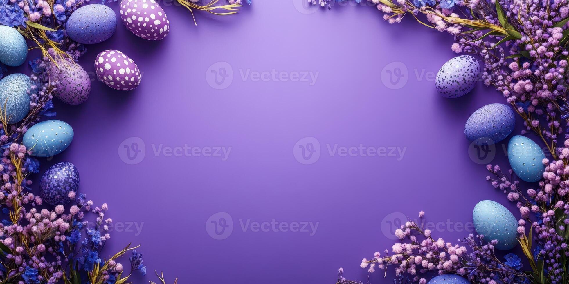 Colorful Easter eggs arranged with flowers on a purple background for festive celebration photo