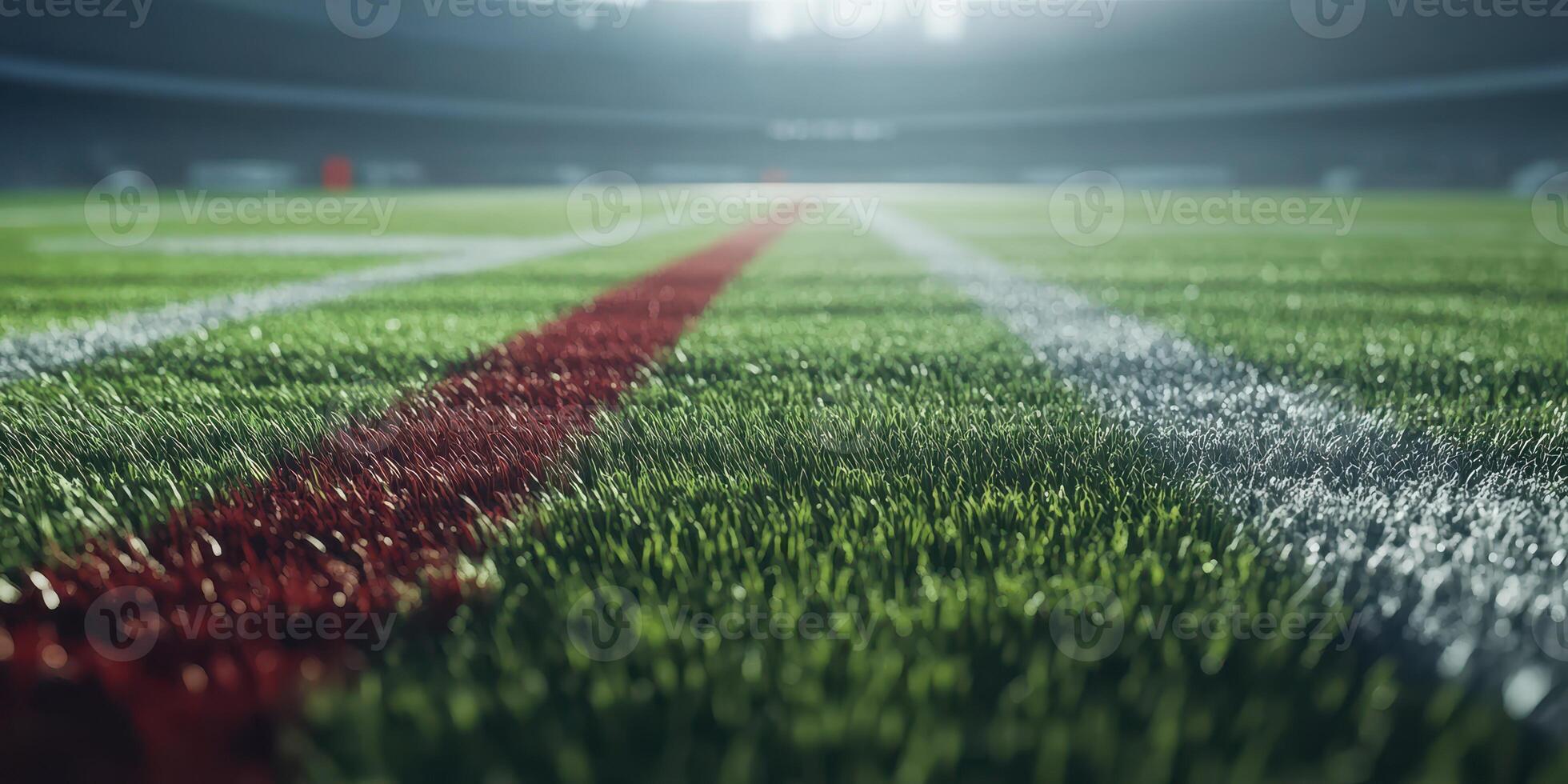Close view of a vibrant football field during an evening match, showcasing bright grass and clear markings photo