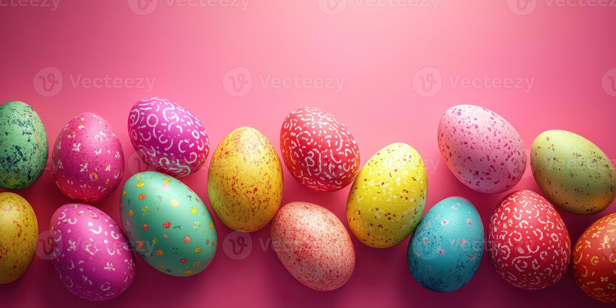 Colorful decorated eggs arranged on a vibrant pink background during an Easter celebration photo