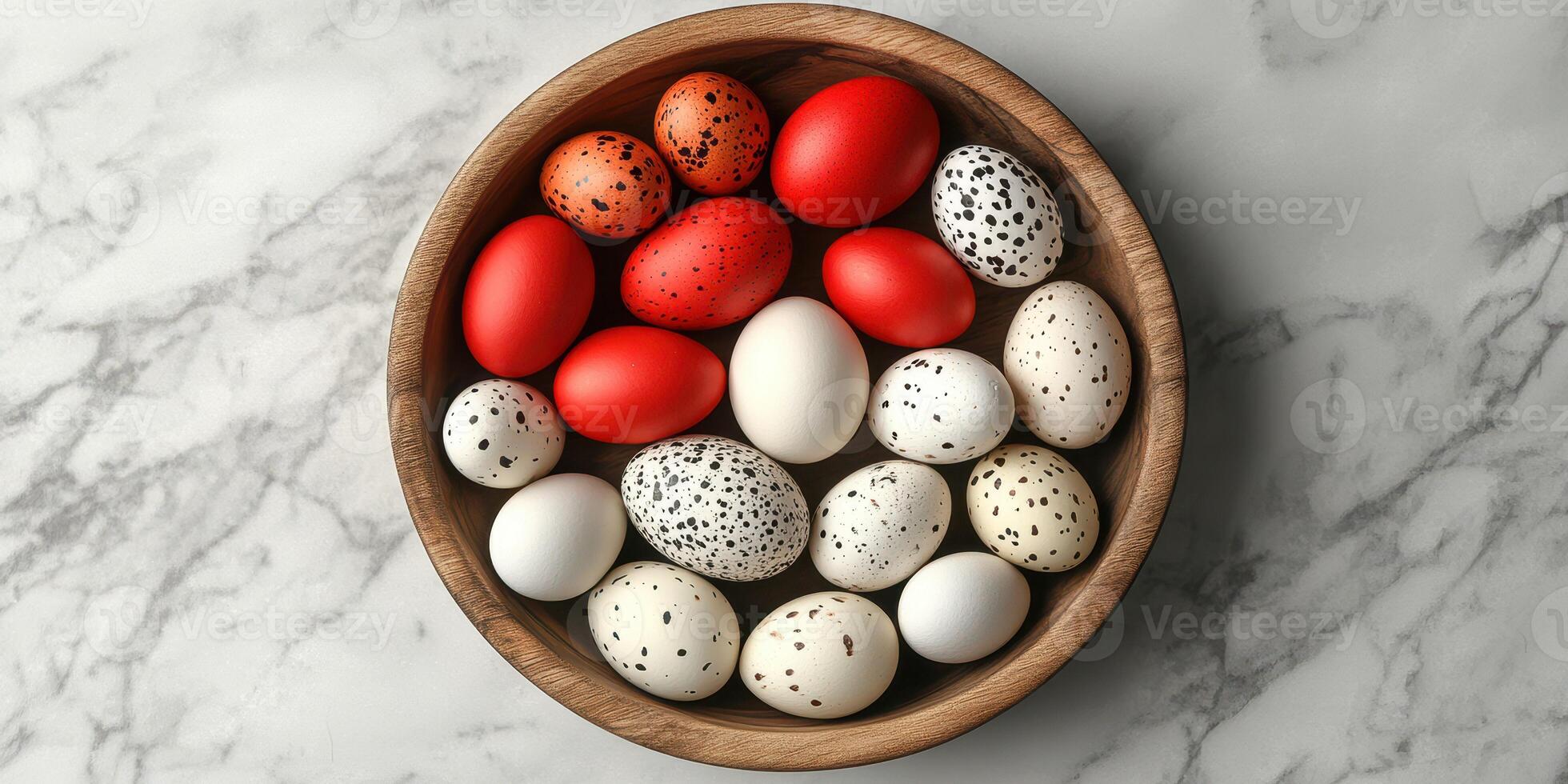 Colorful decorated eggs arranged in a wooden bowl on a marble surface during a festive celebration photo