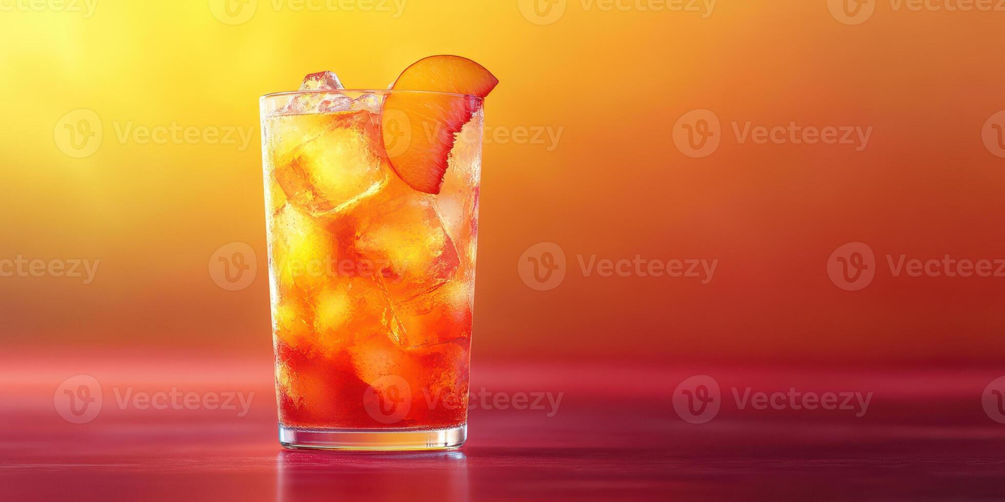 Refreshing cocktail with ice and peach slice set against a vibrant sunset backdrop photo