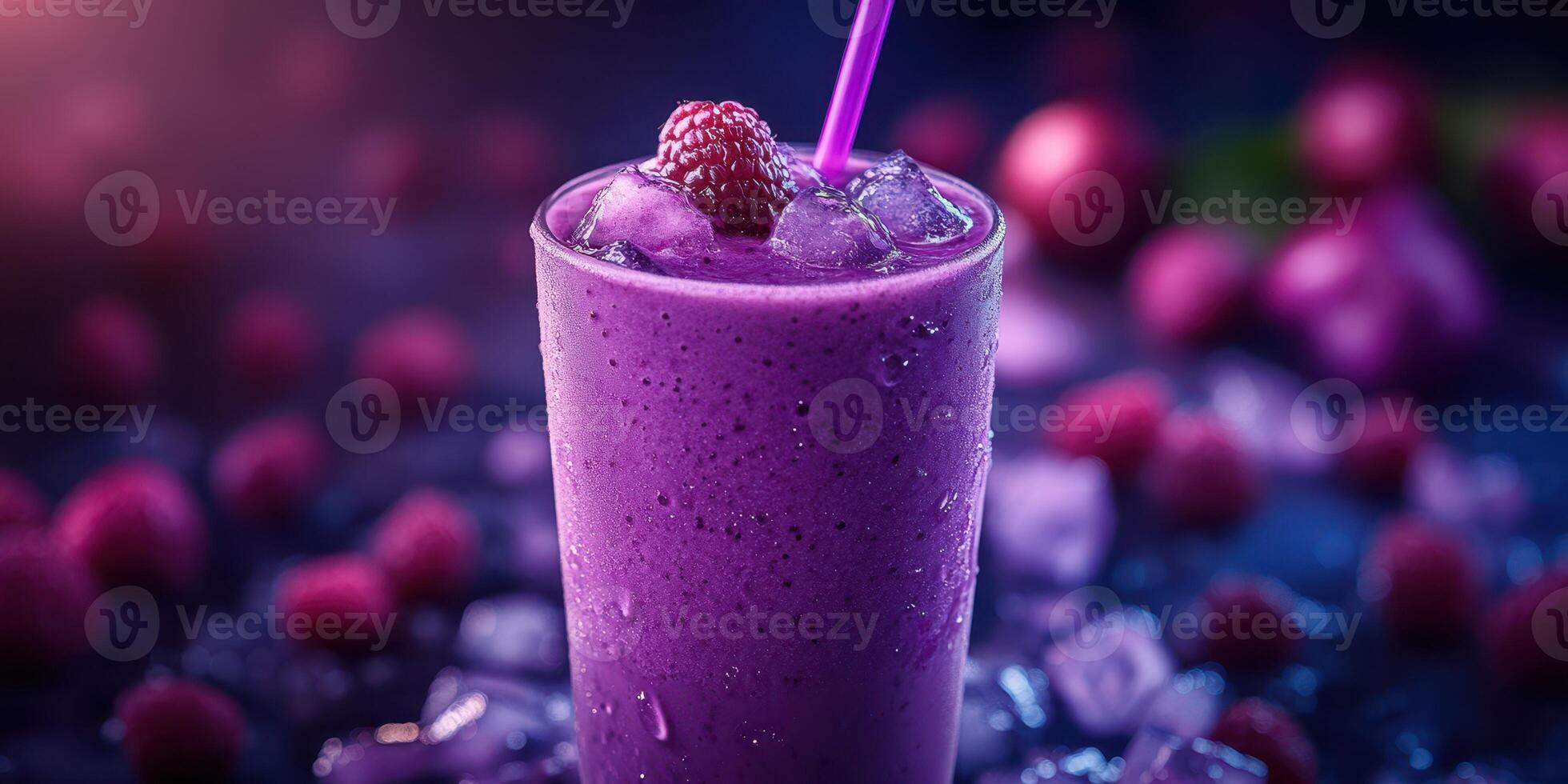 Refreshing berry smoothie served in a tall glass with ice and garnished with raspberries photo
