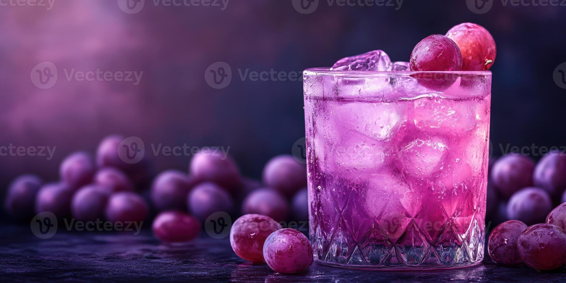 Refreshing grape drink with ice and fresh grapes on a dark surface in a moody atmosphere photo