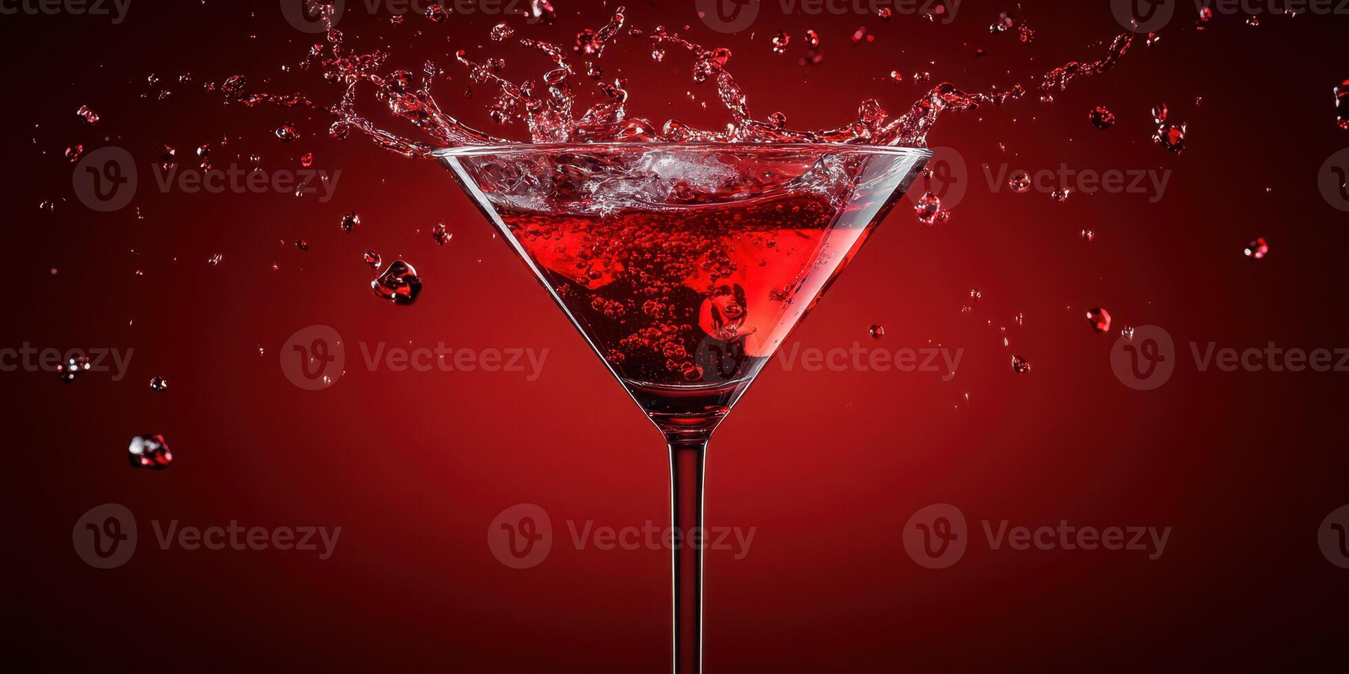 Cherry cocktail splashes in a glass with vibrant red background creating a striking visual effect photo
