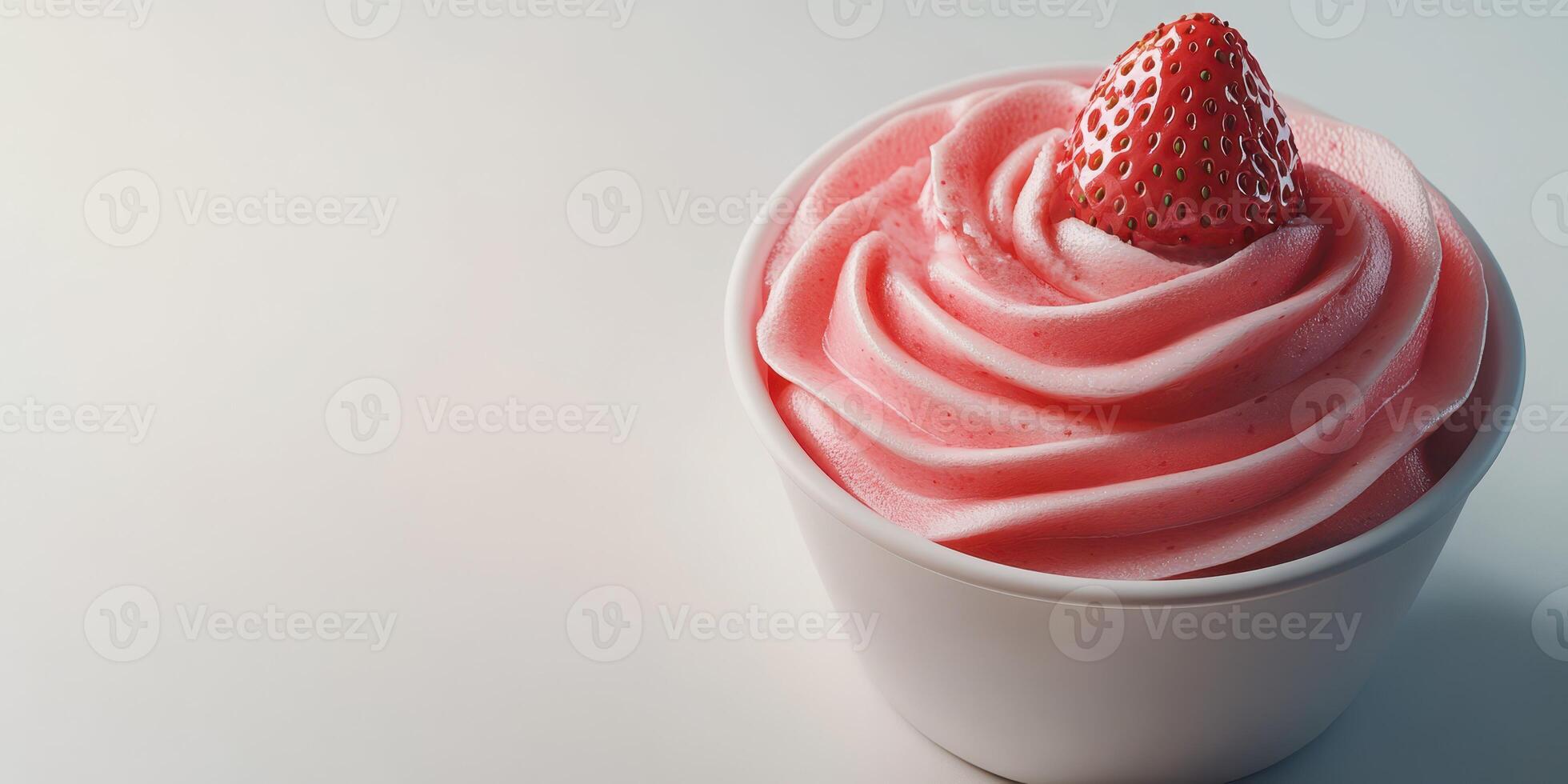 Delicious strawberry soft serve ice cream served in a white cup with a fresh strawberry on top in a bright setting photo