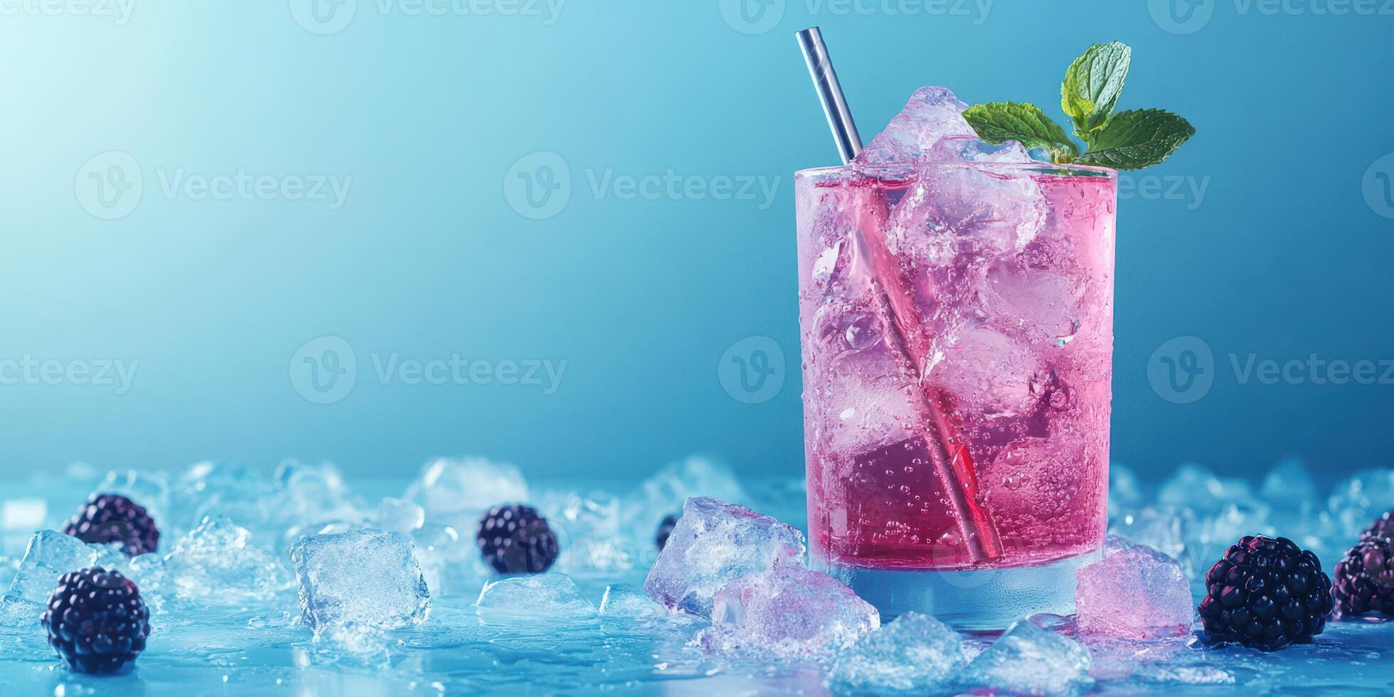 Refreshing berry cocktail served over ice with mint garnish in a vibrant setting photo