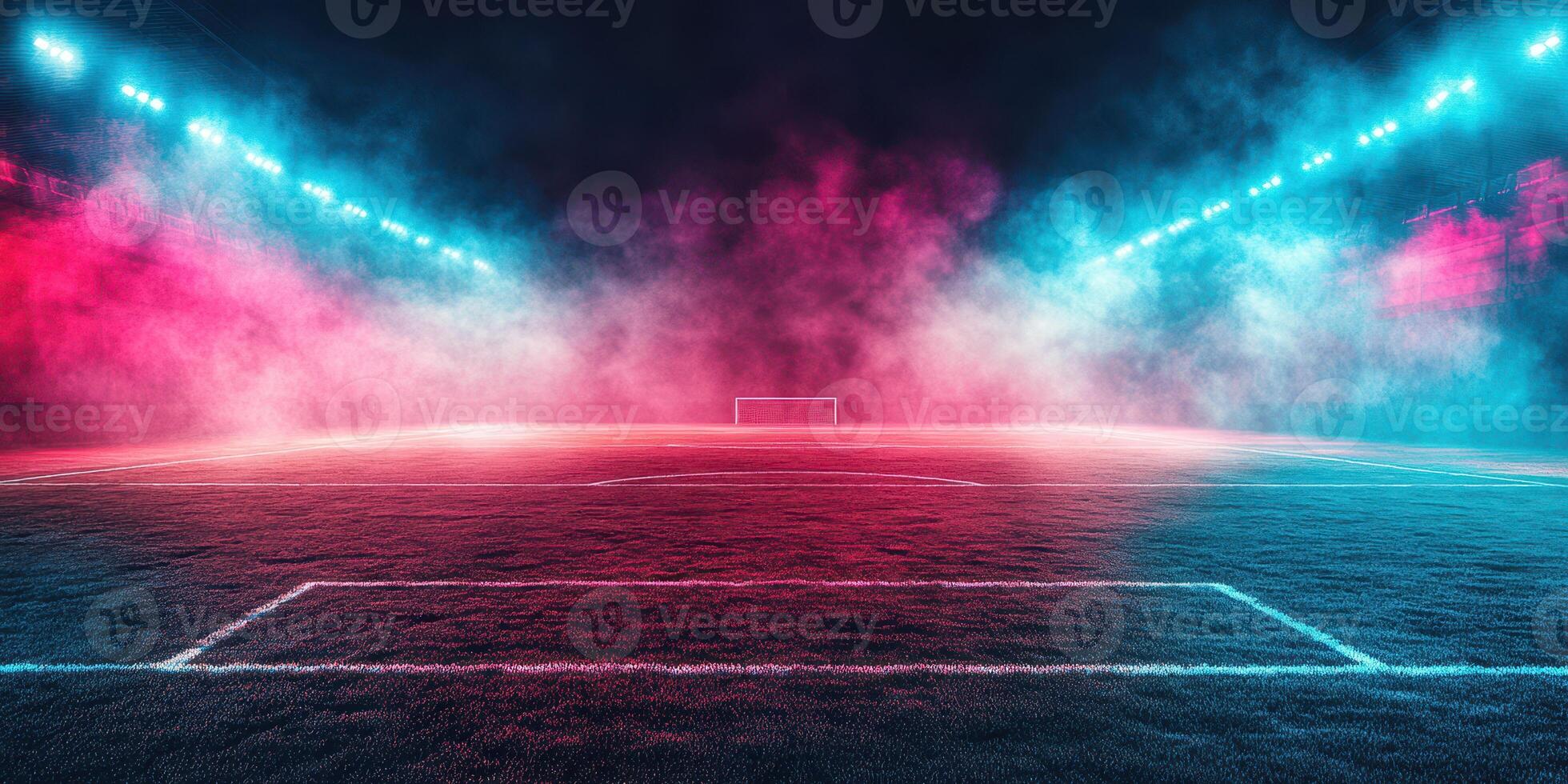 Dramatic soccer field illuminated by colorful lights and fog under the night sky photo