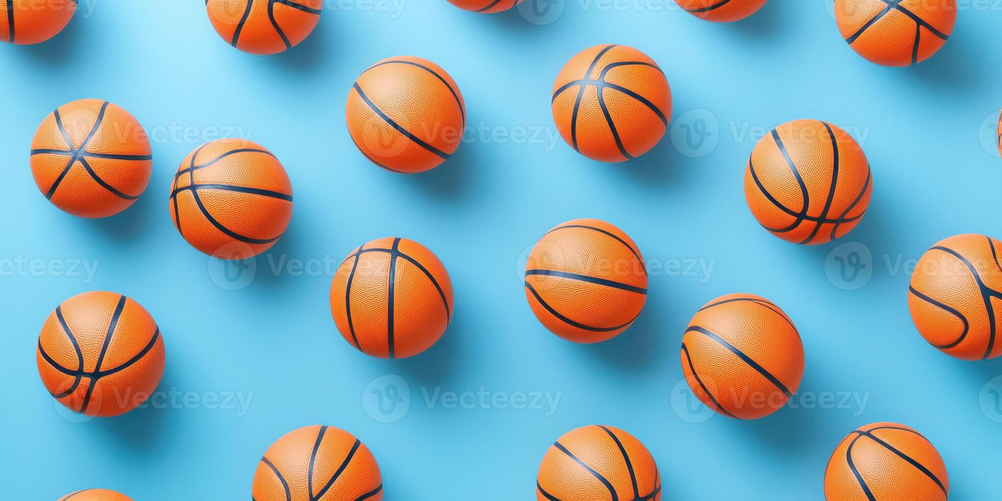 Orange basketballs scattered across a blue background create a vibrant and playful atmosphere in this sports-themed composition photo