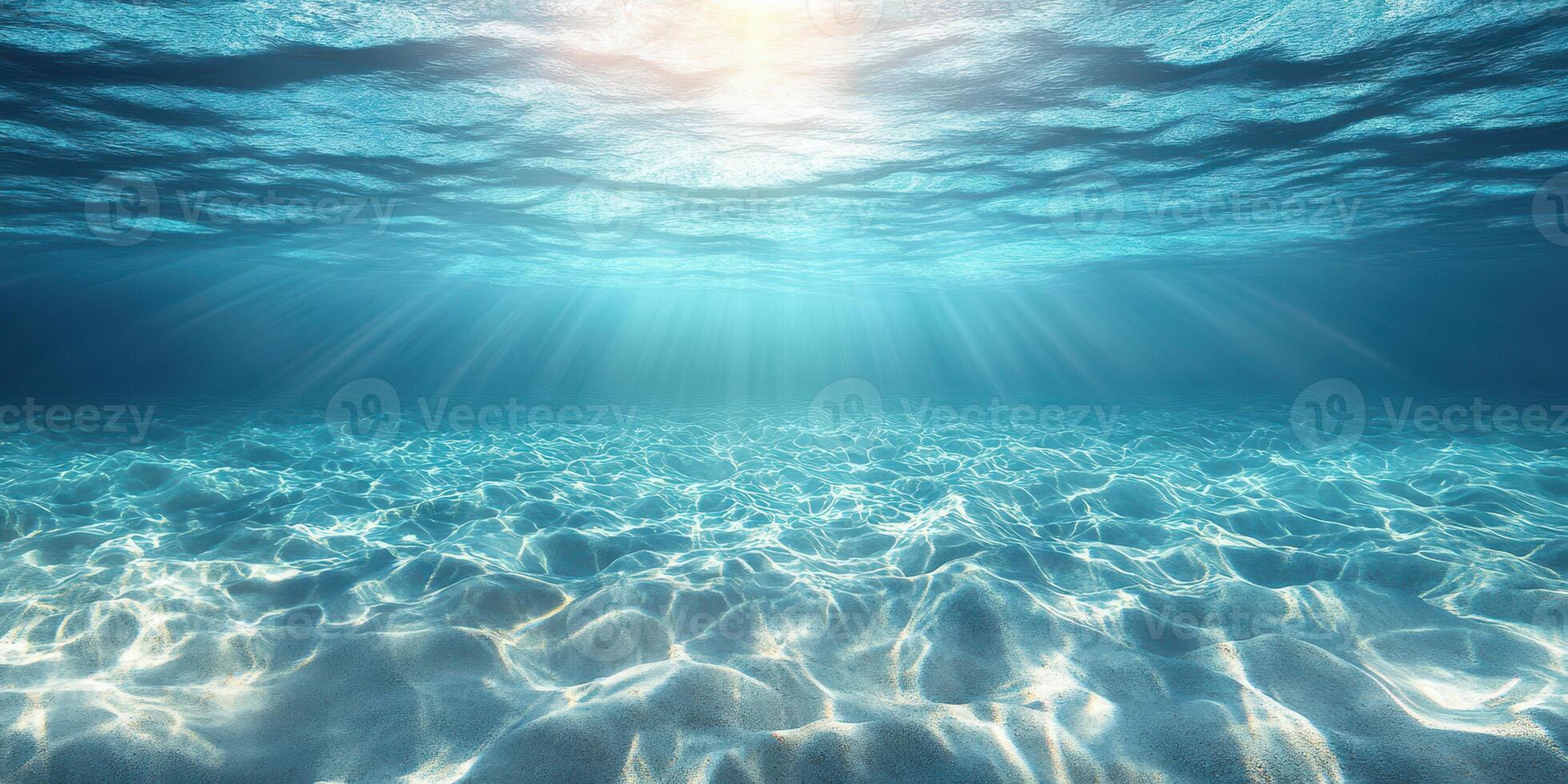 Sunlight filtering through crystal clear water creates a serene underwater scene photo
