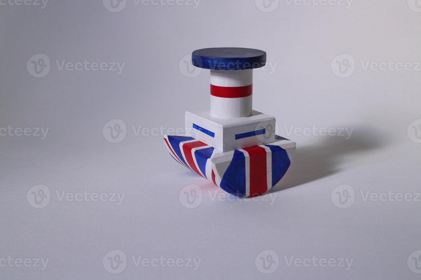 steamer Britannia with a large smokestack in the colors of the British flag photo