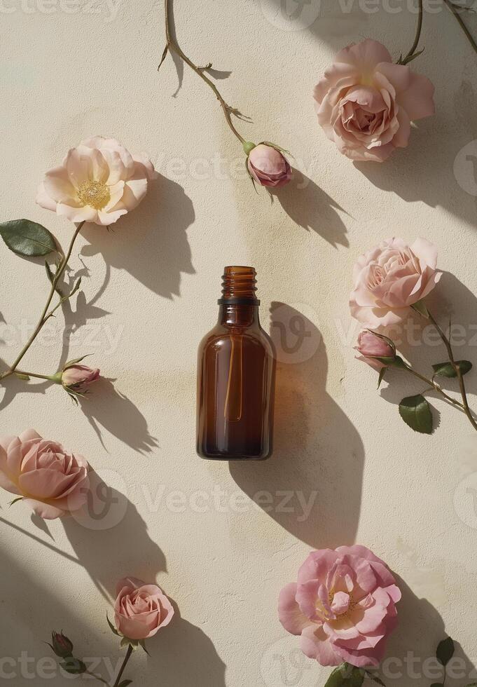 bottle of brown rose oil surrounded by pink roses on beige background creates serene and elegant atmosphere photo