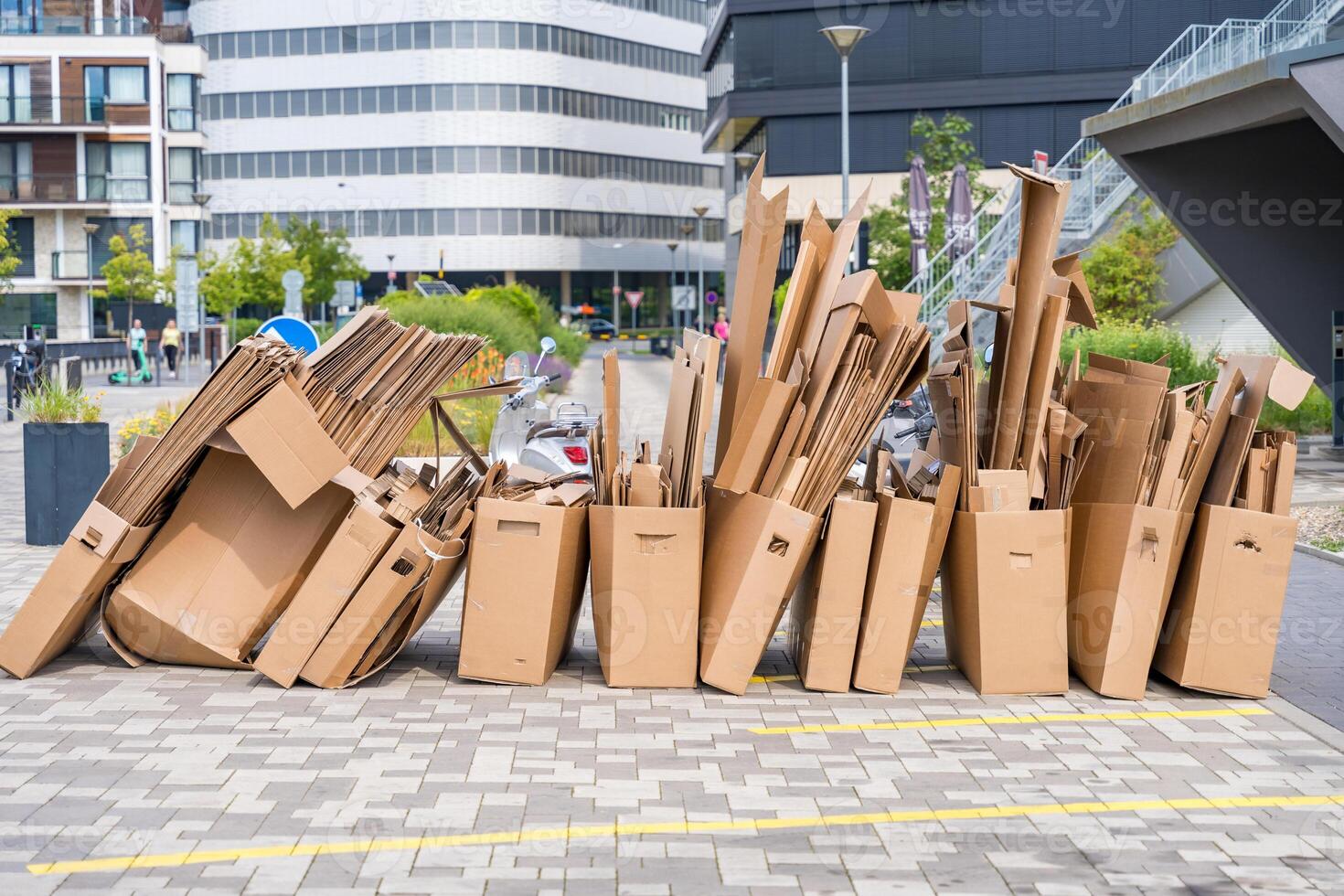 Stacked cardboard boxes prepared for recycling in an urban area in Prague photo