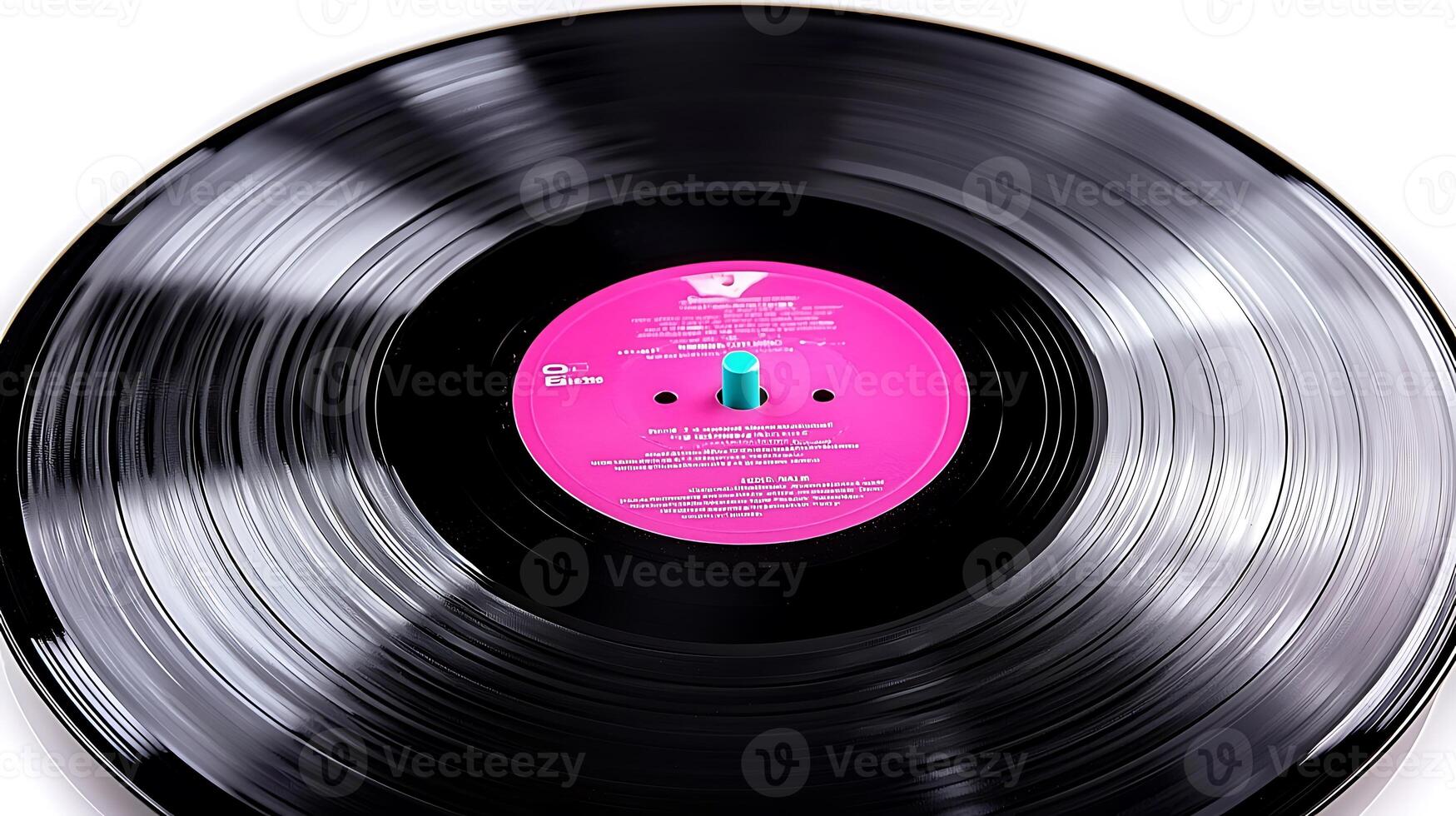 Close-up view of a vintage vinyl record with a vibrant pink label, showcasing its grooves and details photo