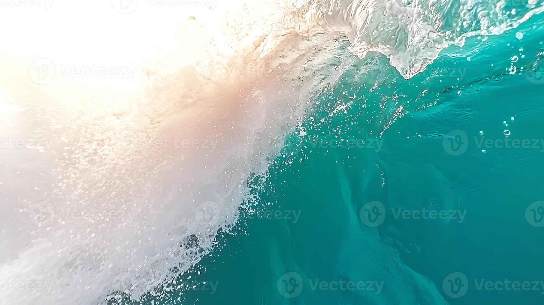 Close-up view of ocean waves crashing with sunlight filtering through, creating a serene atmosphere photo