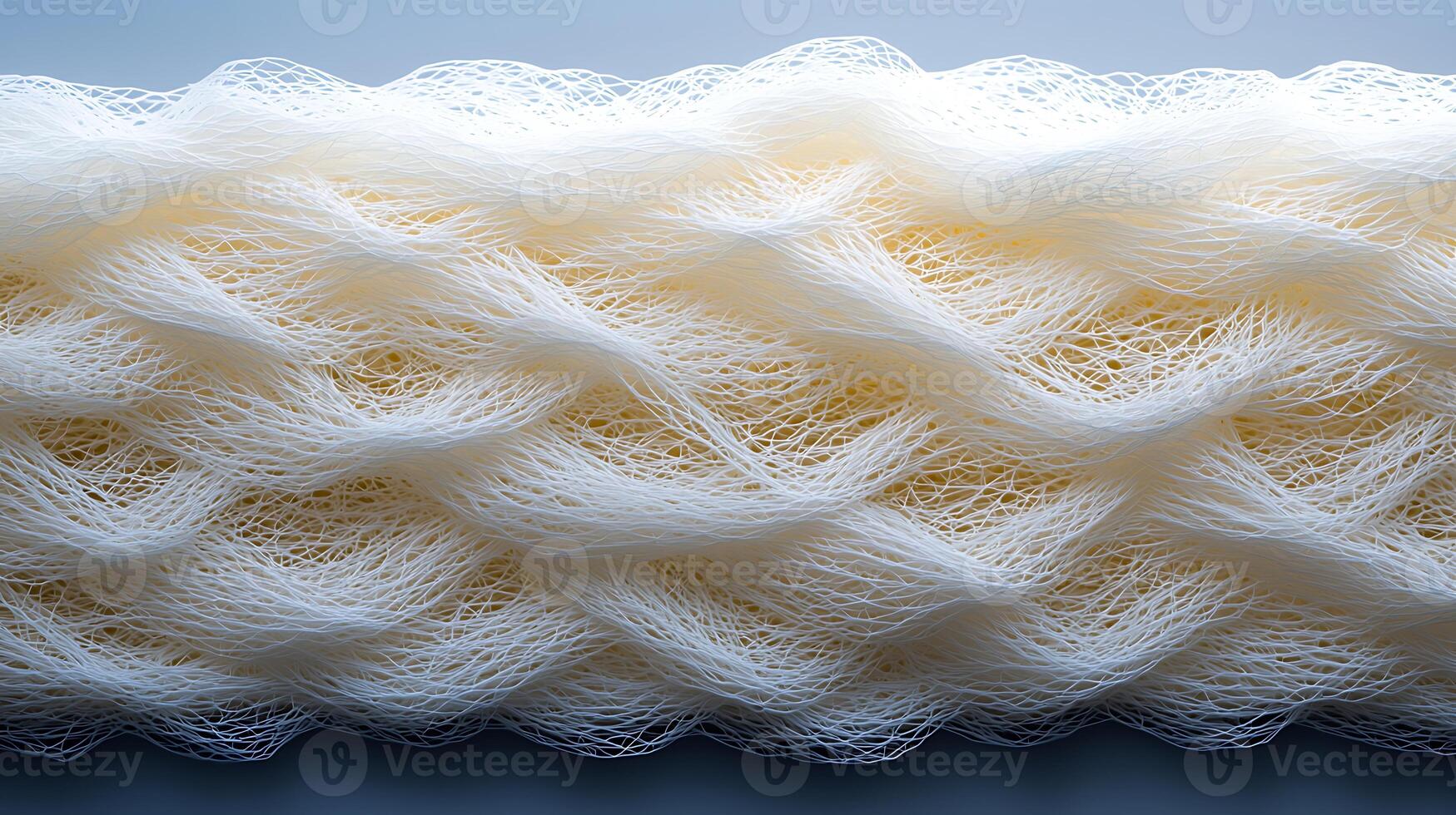 Close-up view of textured white material showcasing intricate wave patterns, ideal for backgrounds photo