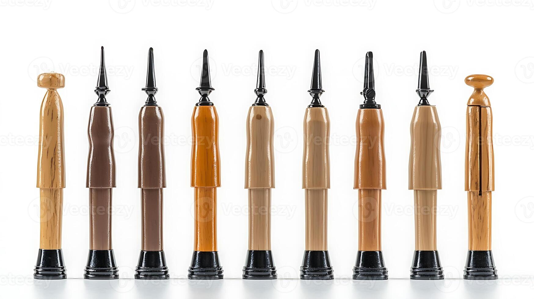Collection of various wooden and plastic pen designs displayed in a clean, modern setting photo