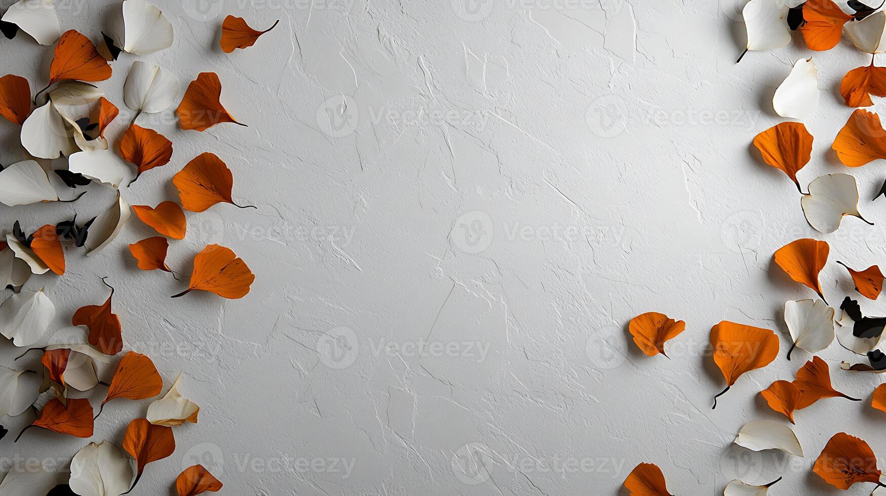 Colorful autumn leaves scattered on a textured white background, creating a serene and artistic ambiance photo