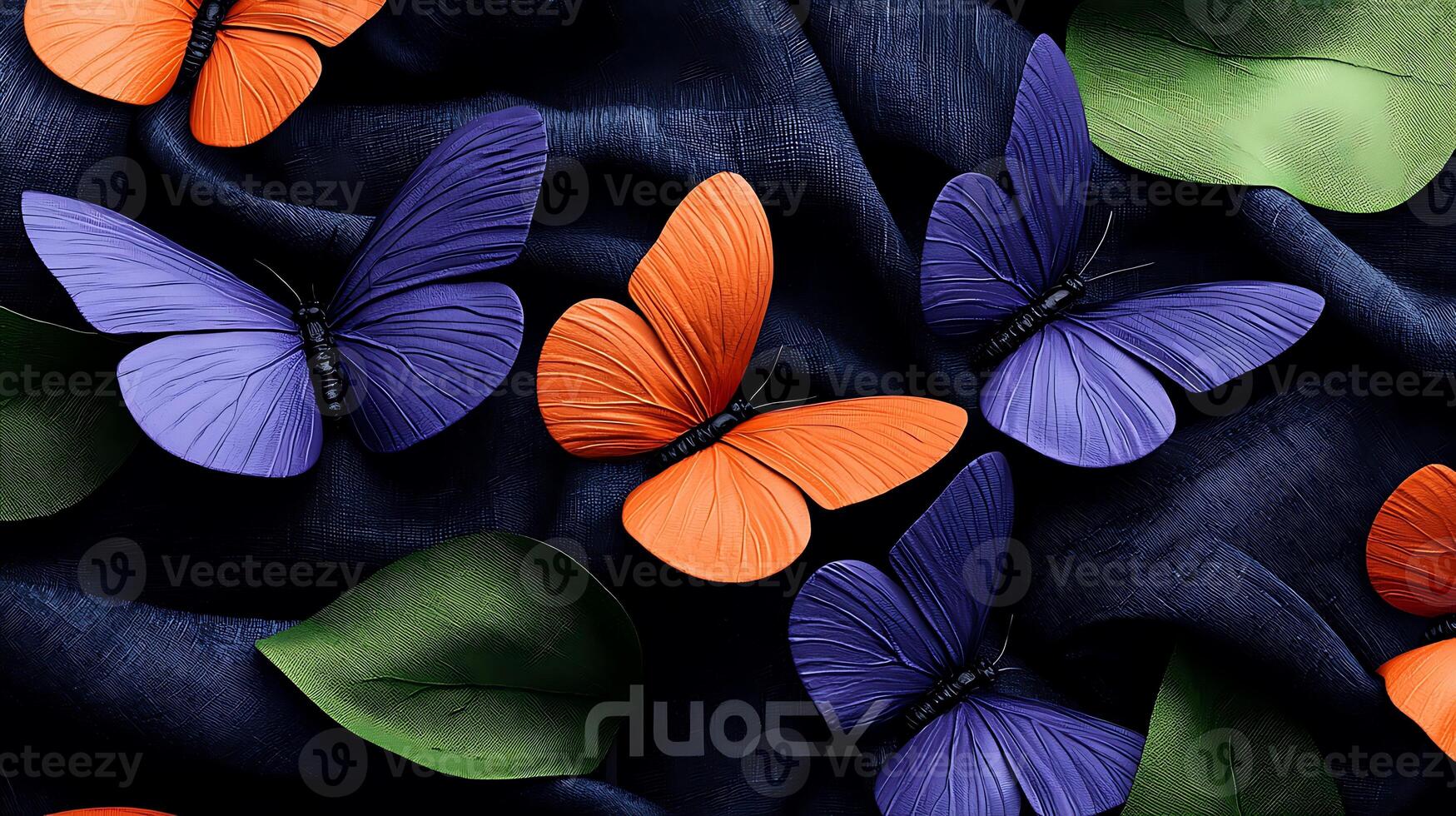 Colorful butterflies in vibrant orange and purple resting on dark fabric with green leaves photo
