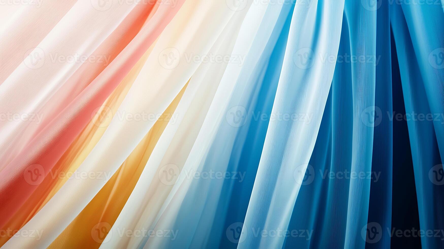 Colorful flowing fabric drapes in soft hues of orange, cream, blue, and teal, creating a serene backdrop photo