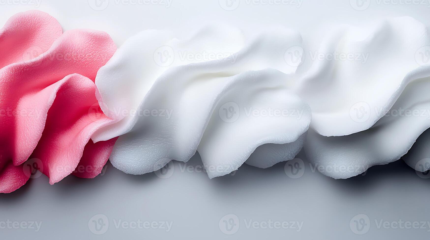 Colorful foam waves in pink and white against a smooth background, ideal for design projects photo