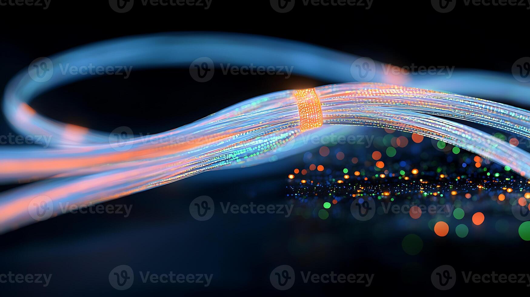 Colorful illuminated fiber optic cables intertwine against a dark background with sparkling lights photo