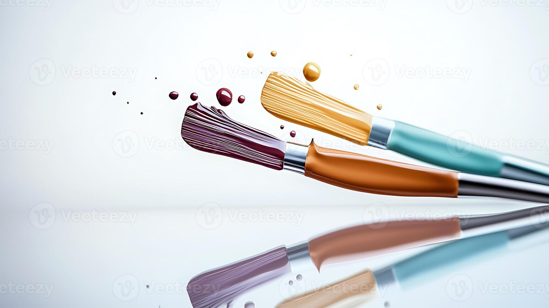Colorful paint brushes with vibrant paint splashes on a reflective surface in a minimalistic setting photo