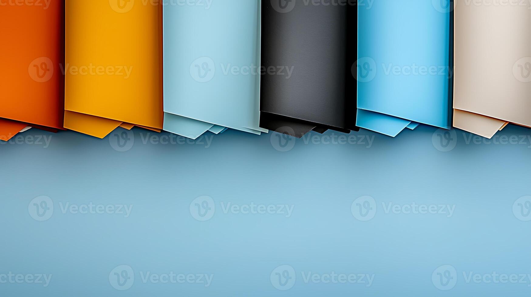 Colorful paper sheets arranged in a creative layout against a soft blue background photo