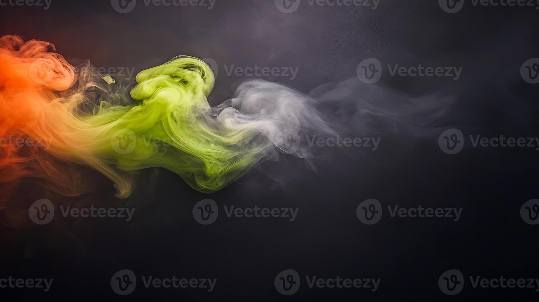 Colorful smoke swirling against a dark background, creating an abstract artistic effect photo
