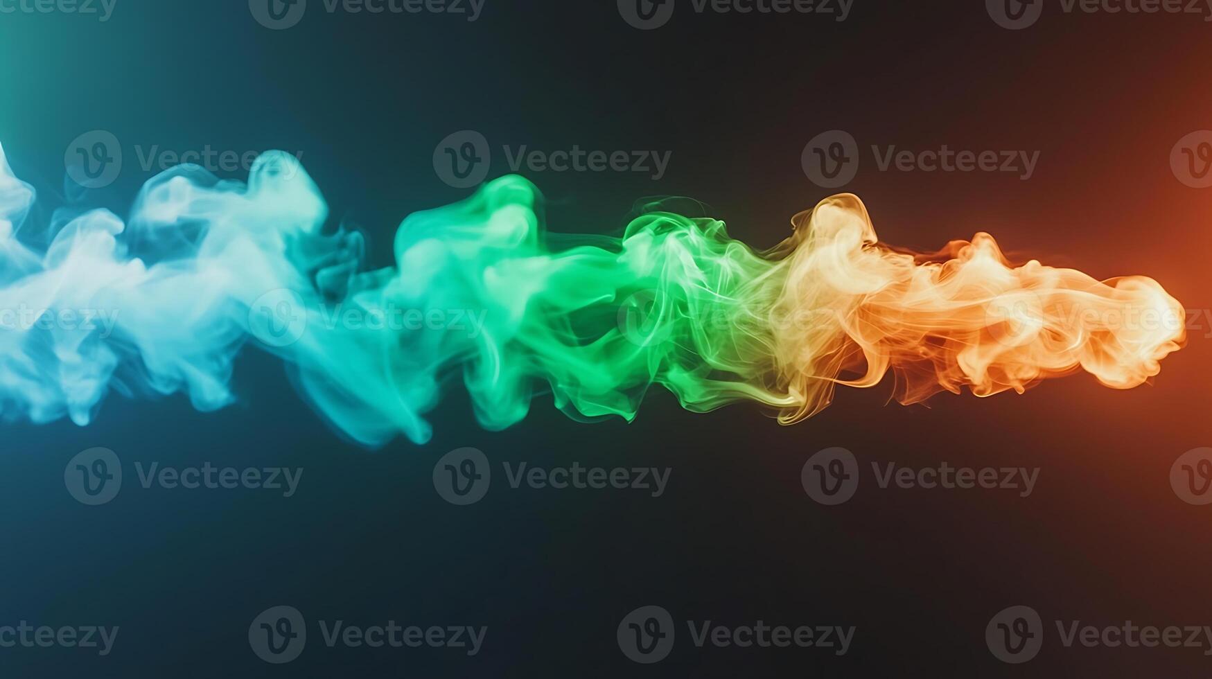 Colorful smoke trails in vibrant blue, green, and orange against a dark background, creating a dynamic visual effect photo
