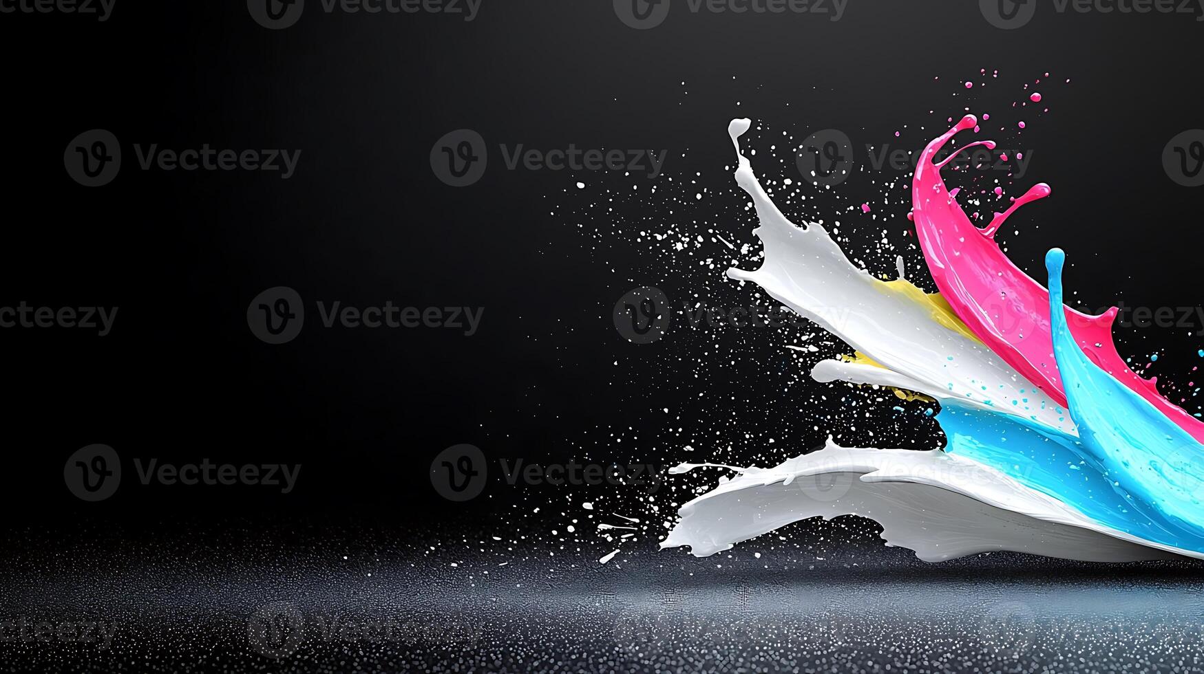 Colorful splashes of paint in motion against a dark background, creating a dynamic visual effect photo