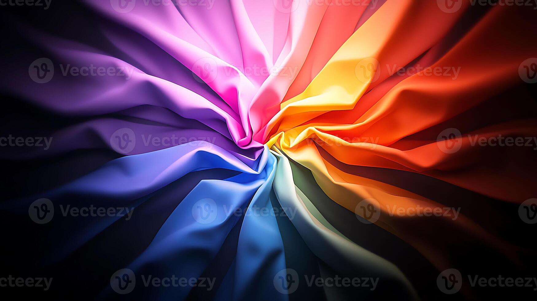 Colorful swirling fabric creating a vibrant gradient, showcasing texture and depth in a dark setting photo