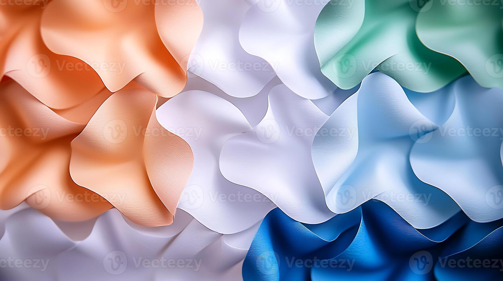 Colorful waves of fabric in soft hues create a textured background for design projects photo