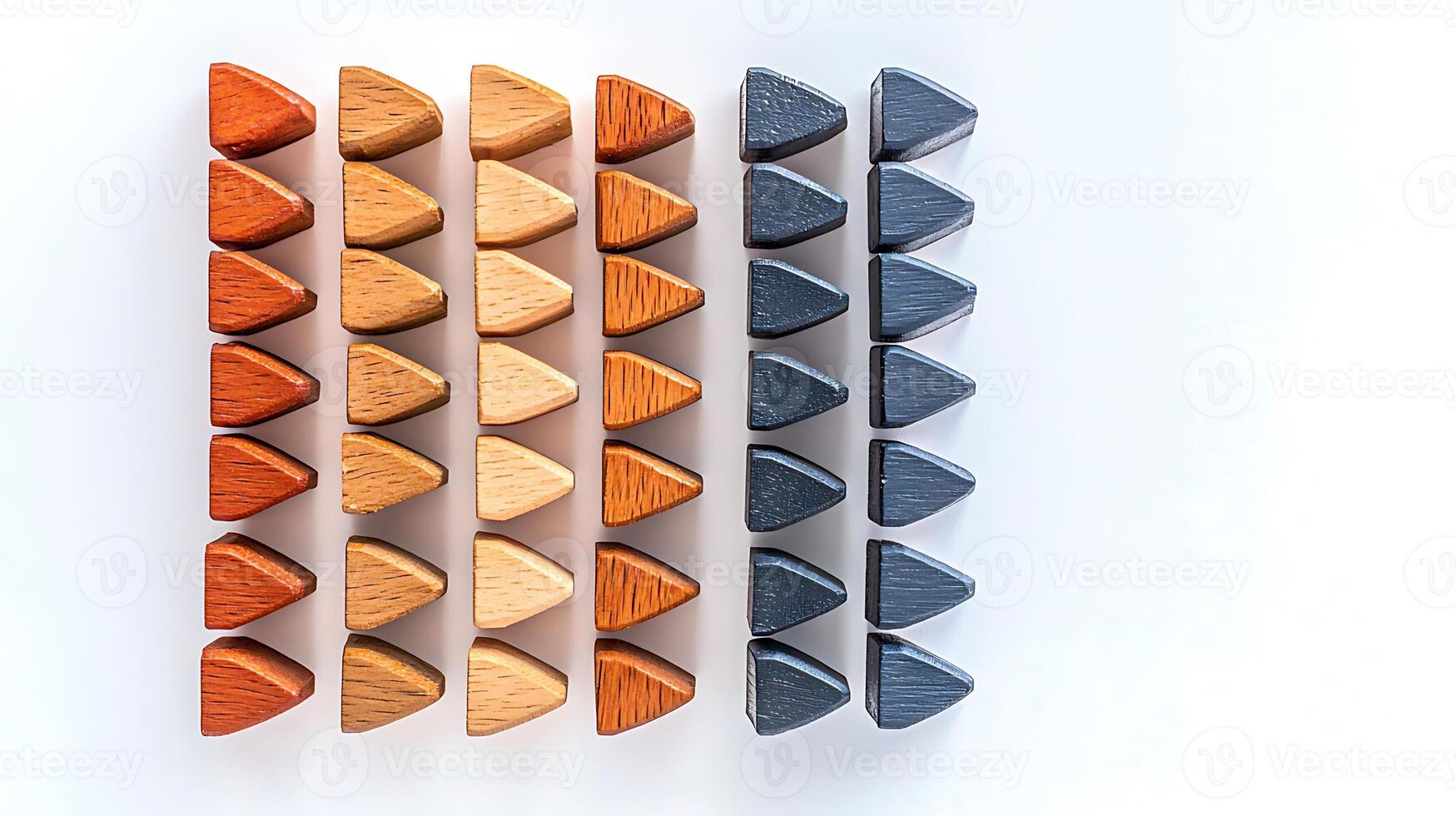 Colorful wooden triangular blocks arranged in rows, showcasing various shades and textures photo
