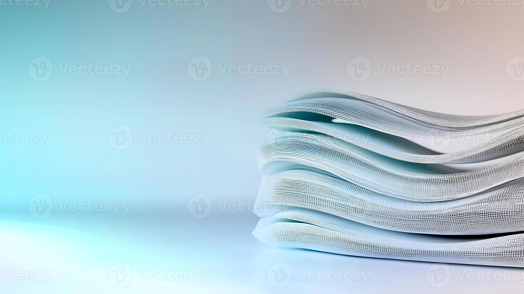 Stacked white paper sheets with soft blue lighting, creating a serene and minimalistic backdrop photo