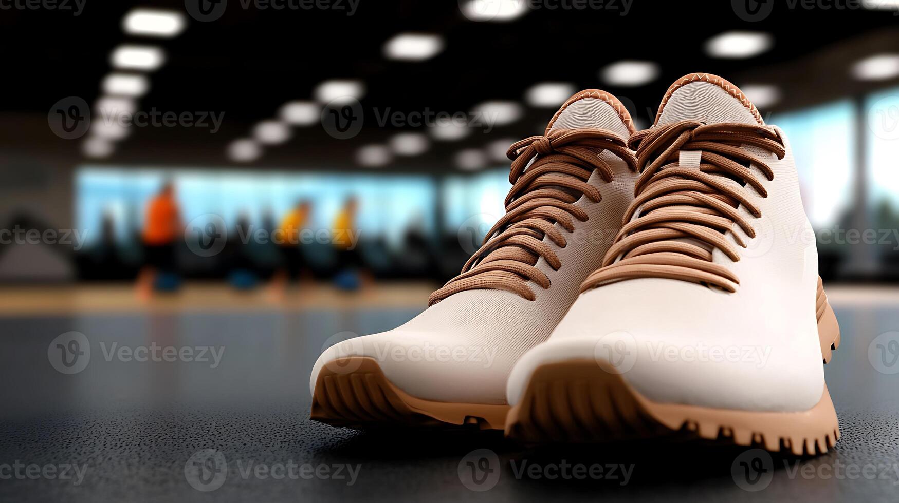 Stylish athletic shoes on a gym floor with blurred fitness enthusiasts in the background photo