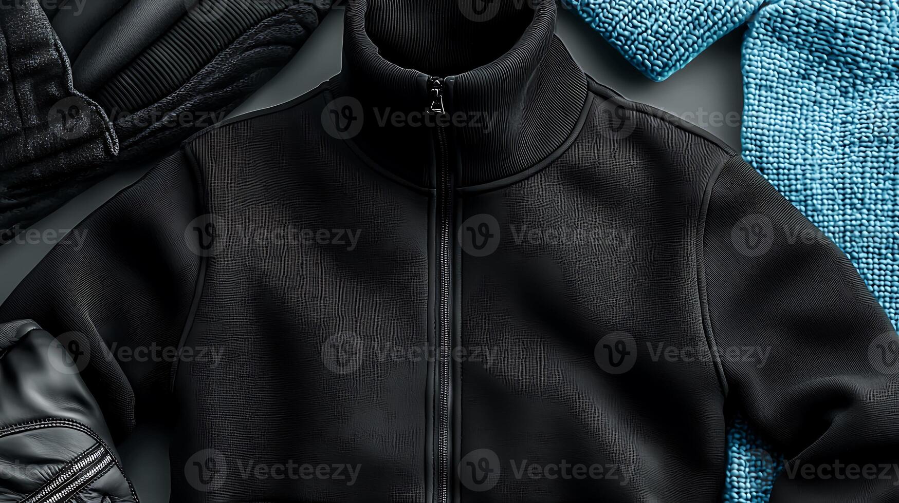 Stylish black jacket on a textured background, showcasing modern fashion design elements photo