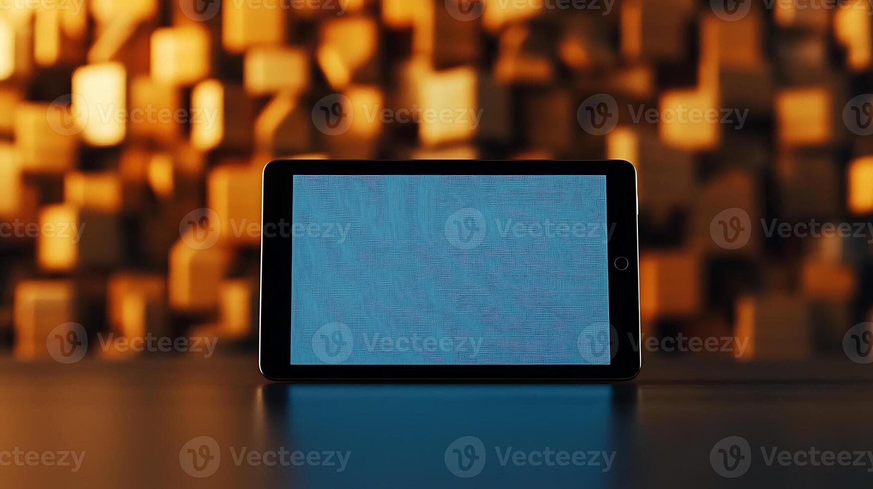 Tablet displaying a textured screen against a backdrop of wooden blocks in warm lighting photo