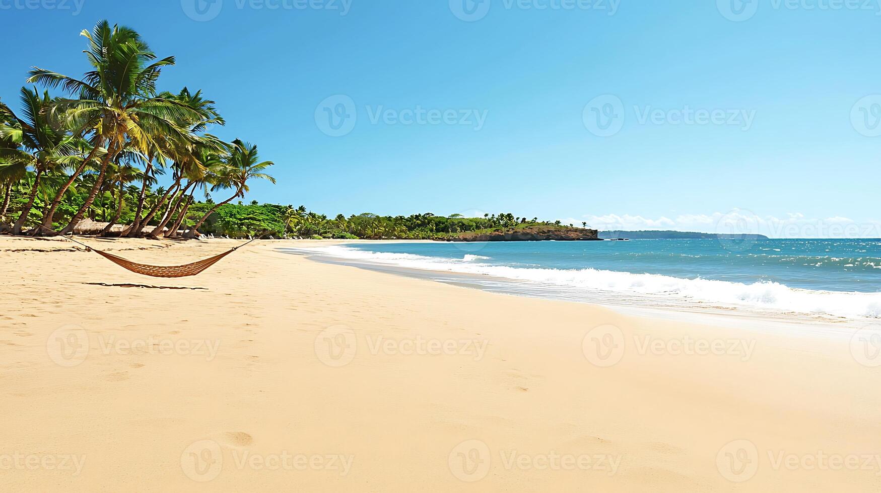 Tranquil beach scene with a hammock, palm trees, and gentle waves under a clear blue sky photo