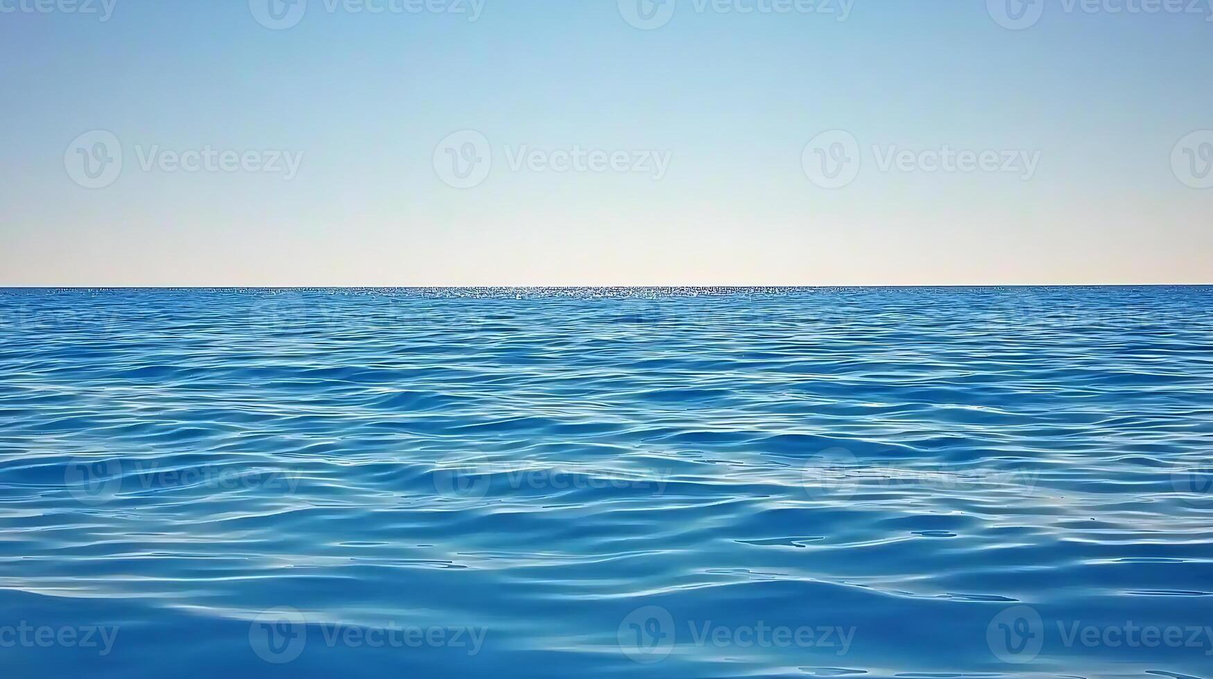Tranquil blue ocean waves under a clear sky, creating a serene atmosphere for relaxation photo