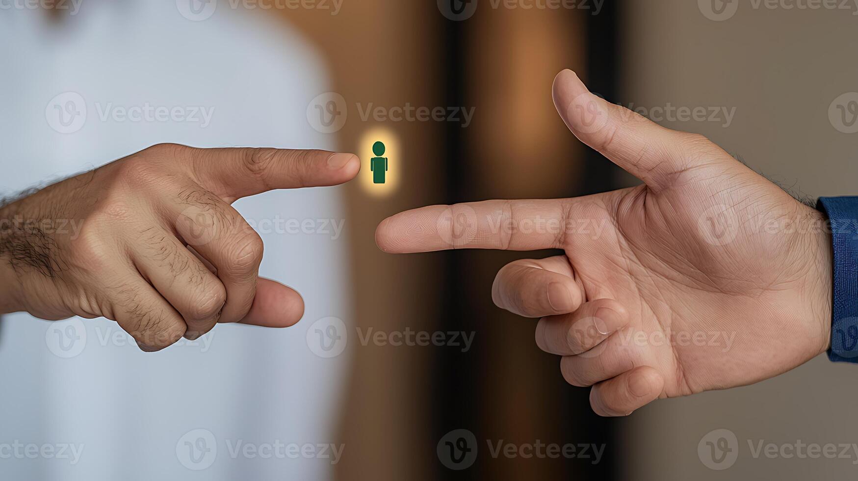 Two hands reaching towards a glowing figure, symbolizing connection and collaboration in a modern setting photo