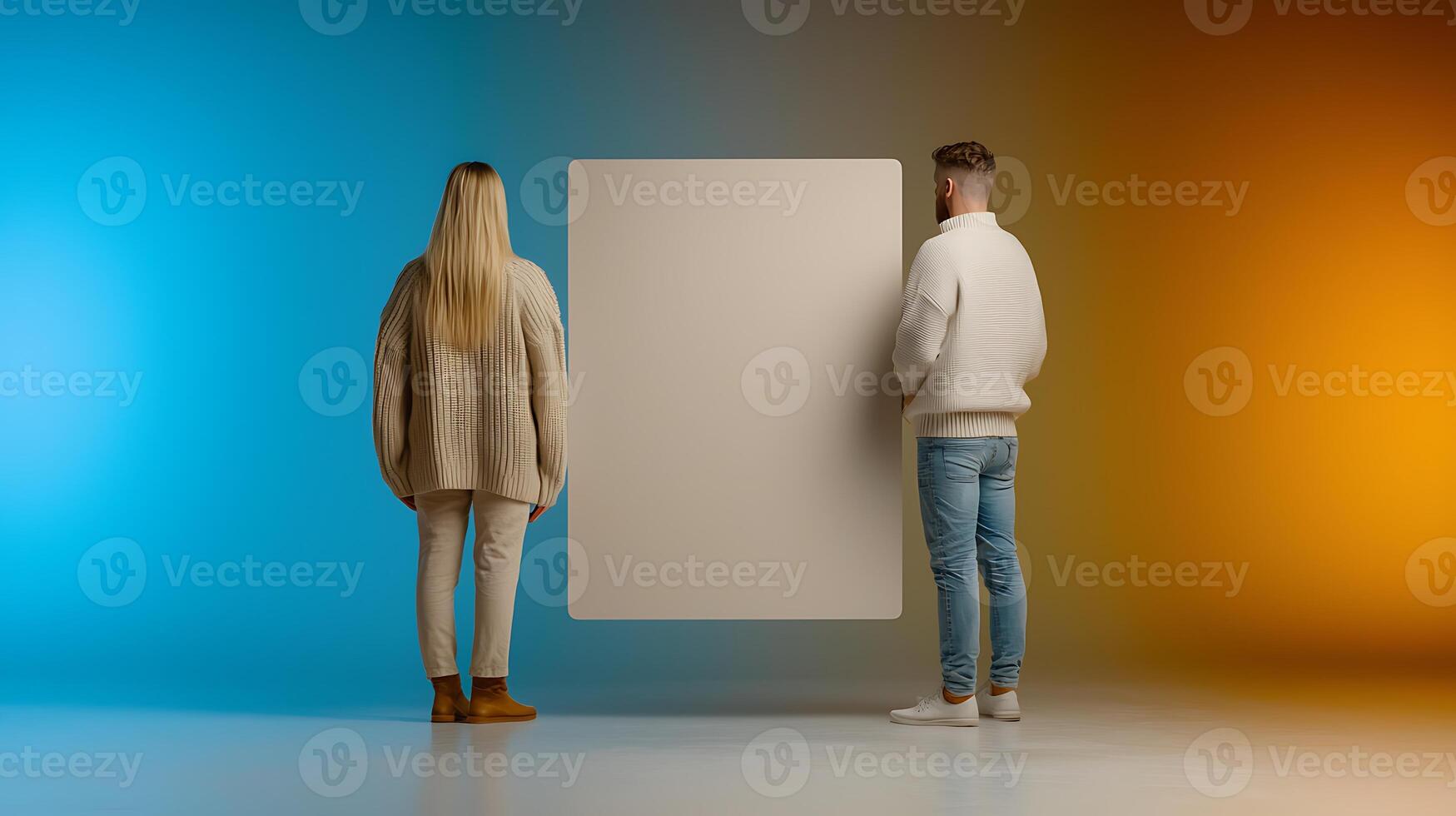 Two individuals standing back-to-back, holding a blank canvas against a colorful gradient backdrop photo