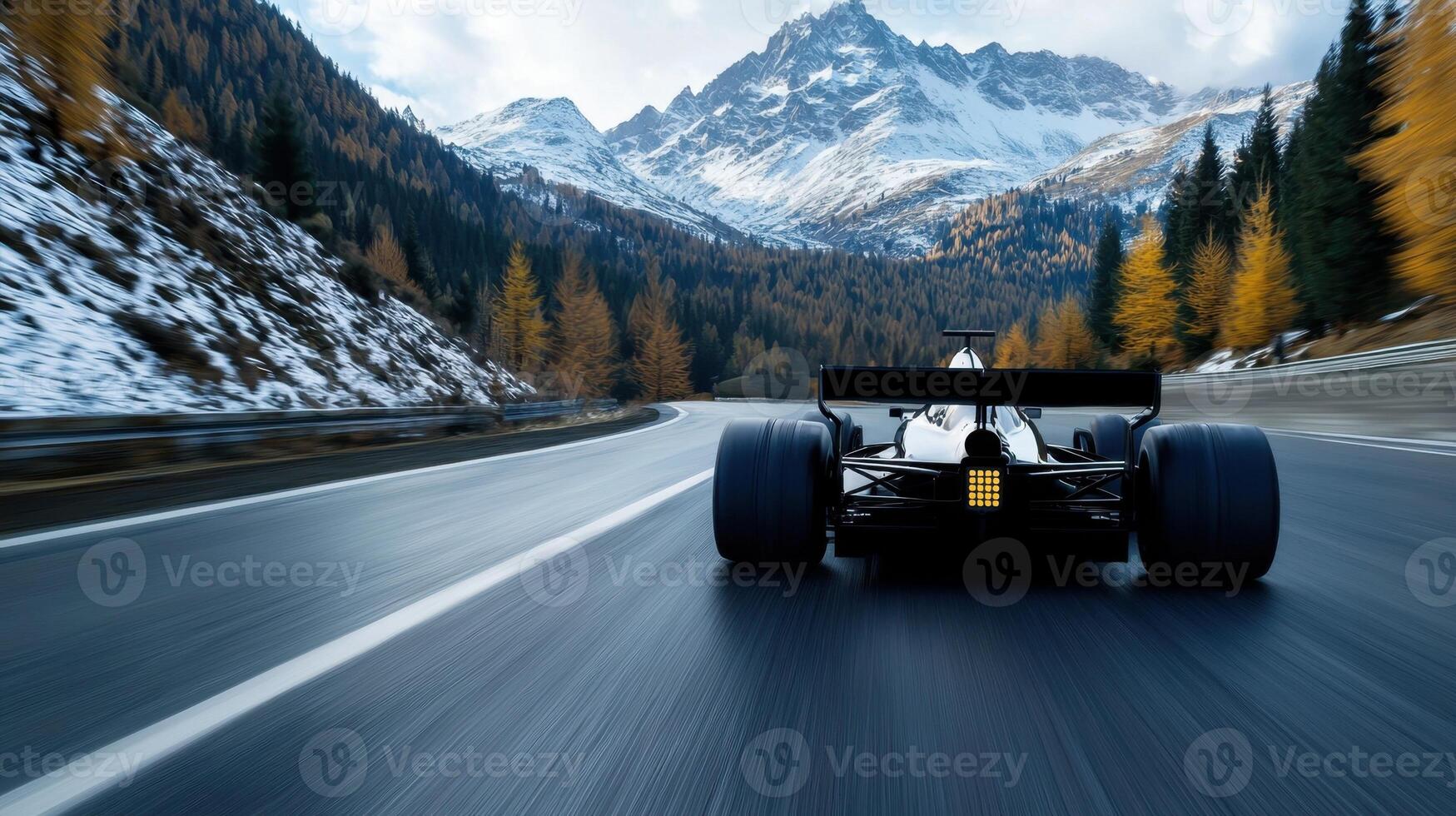 A racing car driving on a mountain road photo